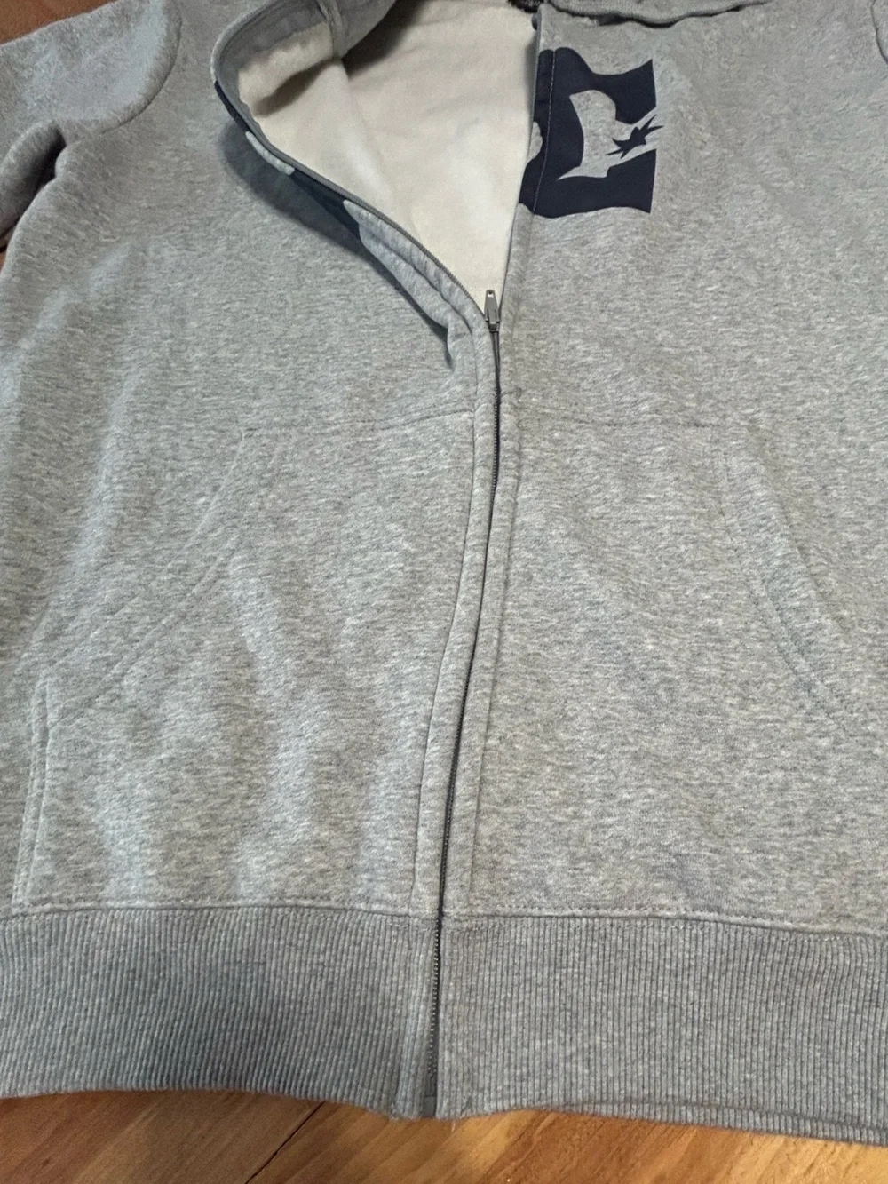 DC Men’s Light Gray Zip-Up Hoodie with Black Logo